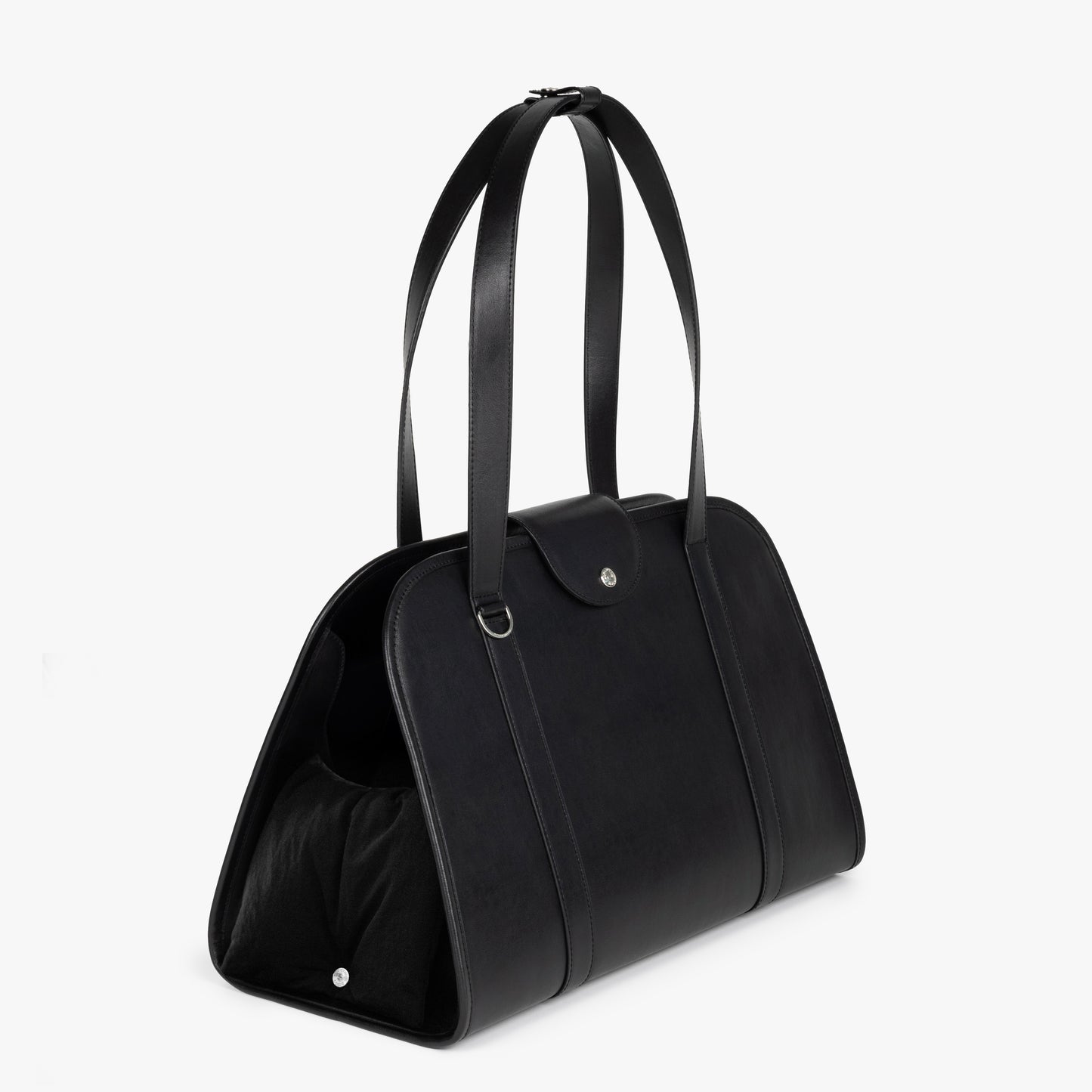 Diagonal view of NOTCOMMON STUDIO’s Companion Tote Bag, featuring a sleek silhouette, structured design, and pet-friendly opening for comfort.