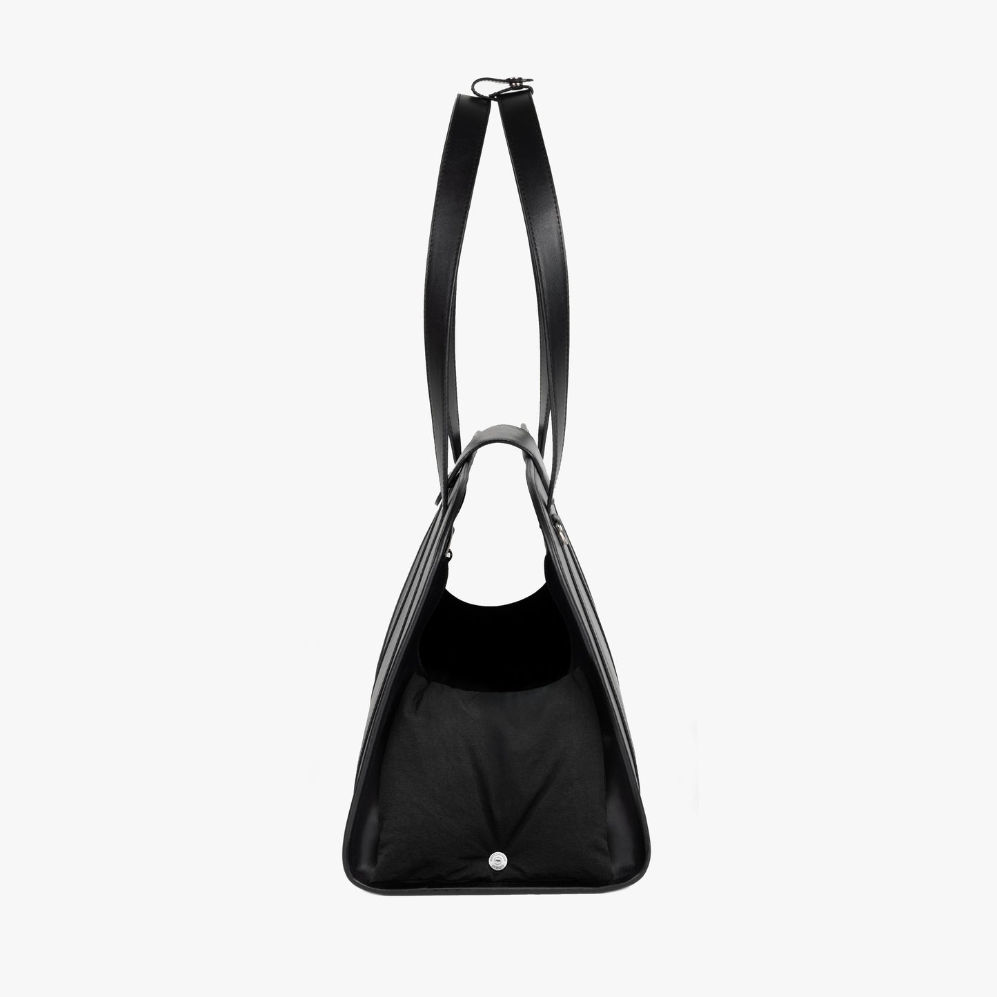 Side view of NOTCOMMON STUDIO’s Companion Tote Bag, featuring a sleek silhouette, structured design, and pet-friendly opening for comfort.