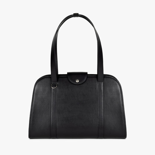 Front view of NOTCOMMON STUDIO’s Companion Tote Bag, showcasing its sleek black recycled leather, minimalist silhouette, and premium craftsmanship.