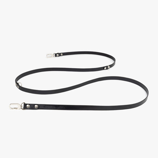 Modern, eco-friendly, and stylish dog 3-in-1 crossbody dog leash made with recycled leather.